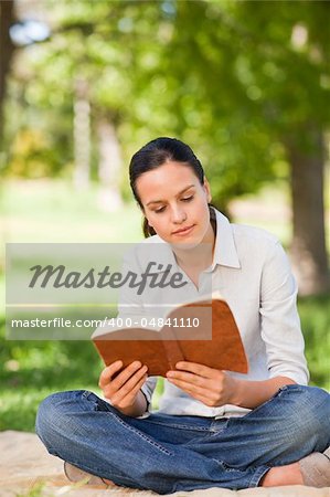 Woman reading in the park