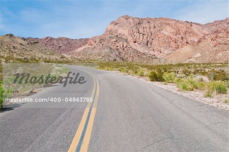 Lonely road through the mountains near Nelson, Nevada