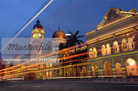 Cityscape of night with famous building and cars motion blurred in Kuala Lumpur, Malaysia, Asia.