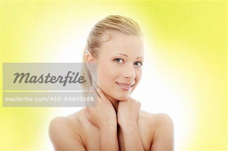 Portrait of the attractive girl without a make-up Over abstract green background
