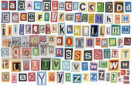 Colorful alphabet made of magazine clippings and letters . Isolated on white.
