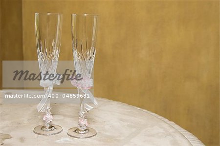 Two champagne glasses for the bride and groom