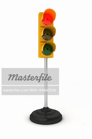 Toy traffic light over white background showing red