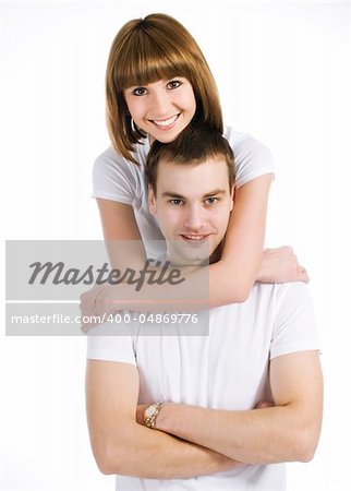 young couple loving each other on white background