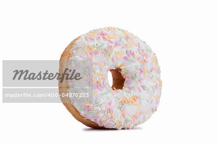 Pink Iced Doughnut covered in sprinkles isolated against white background