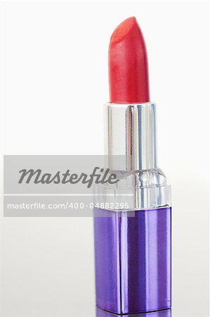 Portrait of a red lipstick against a white background