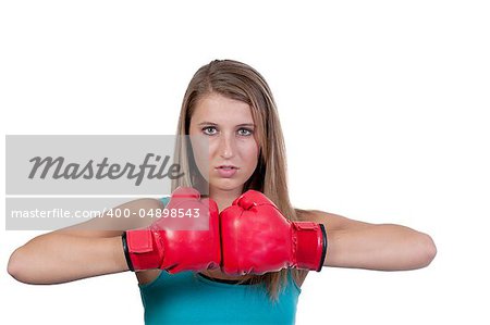 A beautiful young woman wearing a pair of boxing gloves