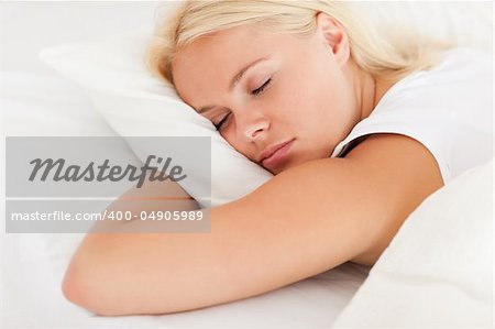 Quiet woman sleeping in her bedroom