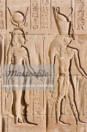 Egyptian hieroglyphs depicting a man and a woman
