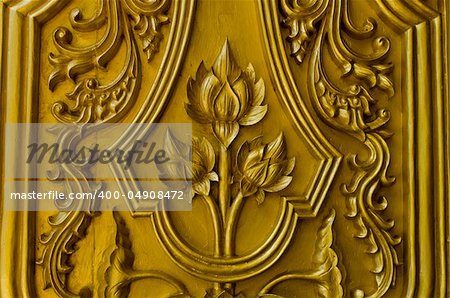 gold lotus door in Thailand's temple. In Thailand's temple is free license