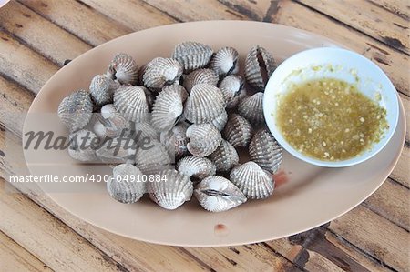 a picture of Poached oysters cooked in thai style