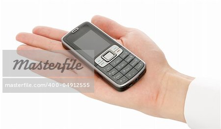 Cell phone in a hand isolated on white
