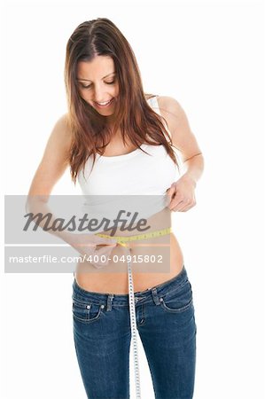 Beautiful woman measuring waist. Isolated on white