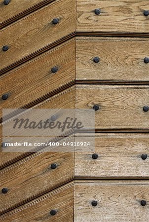 wooden background or texture with iron rivets