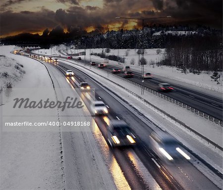Busy road in winter evening