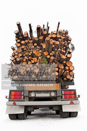 Back of truck loaded with timber