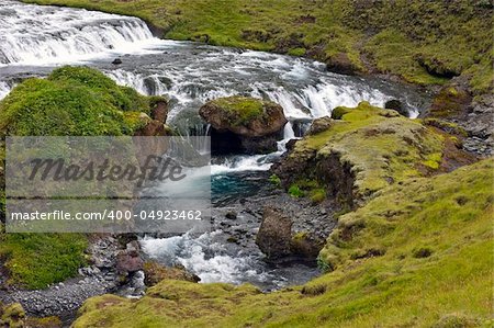 A cascaded waterfal near the famous Skogar foss on the south coast of Iceland