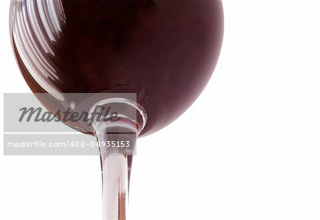 Beaker of red wine isolated on white