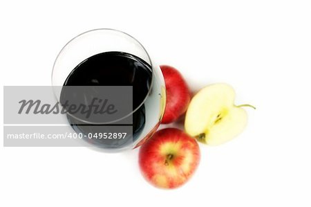 red wine in a glass with red apples