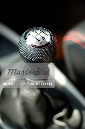 The gear stick of a modern sportive car