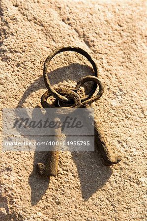 Antique Rusty Keys on a Stone