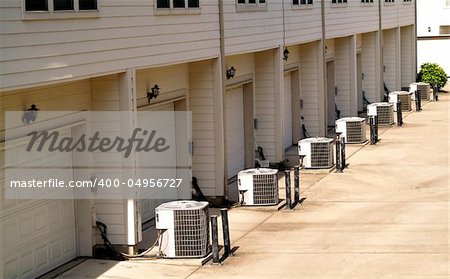 Row of town houses with air conditioning units outside