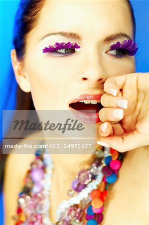 Portrait of attractive beautiful young sexy woman with artificial eyelashes and beautiful makeup