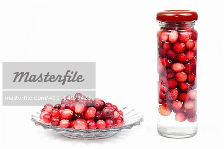 Cranberry in jam-jar and plate