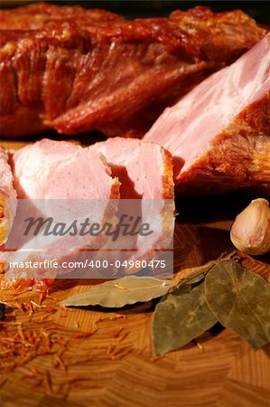 Gentle ham with and garlic Tasty meat natural composition in country style.