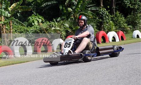 Man racing a go cart