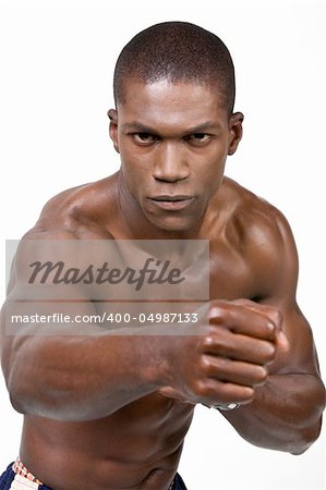 African American Athlete shows some muscle