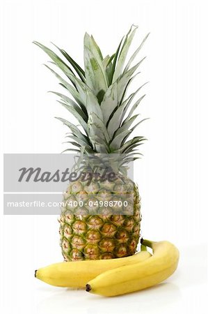 Pineapple with bananas on white background