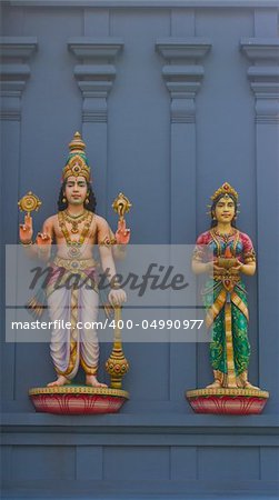 Statues of Hindu gods Vishnu and his wife Lakshmi