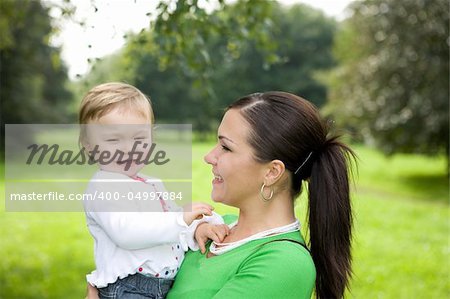 happy family on green meadow