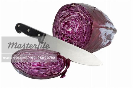 sliced red cabbage and a knife on white background