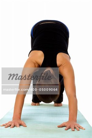An image of a young woman doing yoga excercises
