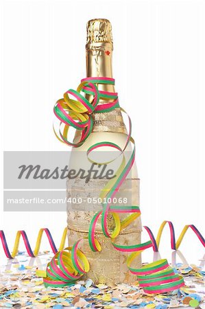 Champagne bottle, ribbons and confetti for celebrations