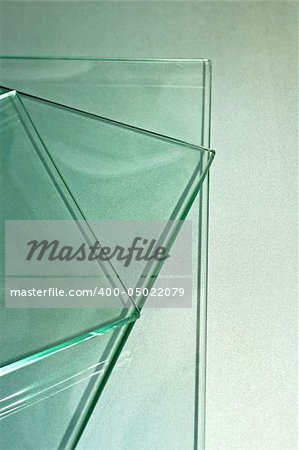 Three sheets of plain glass toned in green