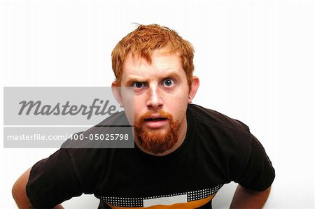 A young man looking inquisitive.