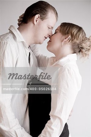 Studio portrait of a young amorous couple