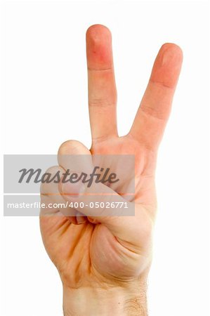 A male hand with two fingers up in the peace or victory symbol.  Also the sign for the letter V in sign language.  Isolated on white with clipping path.