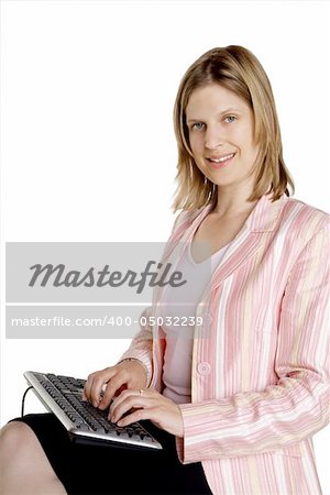 a young business woman with jacket and keyboard