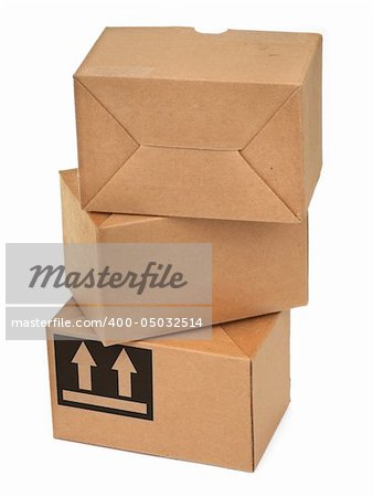 stack of three cardboard boxes againt white background