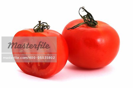 Tomato and half of tomato on a white background