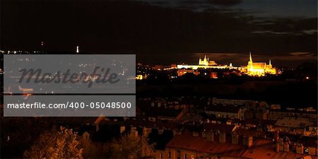 Prague with castle and churches in the night