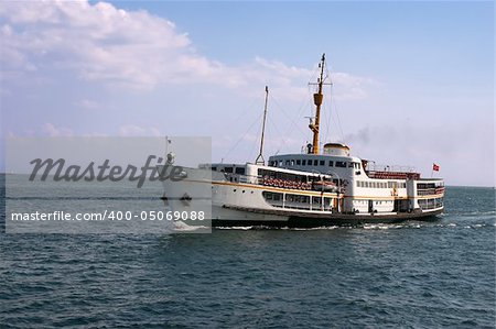 Large motor boat in ocean with turkish flag