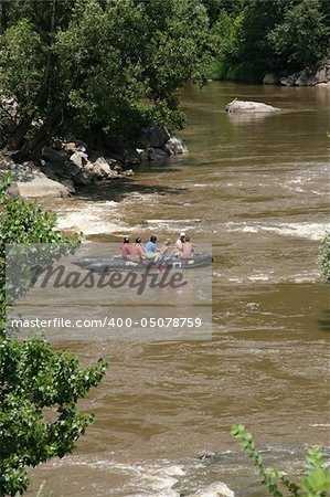 few men rafting on a river Ibar in Serbia