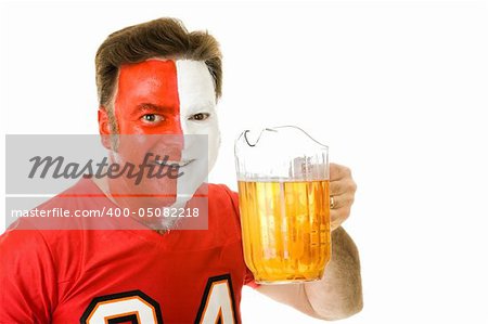 Thirsty sports fan with painted face, holding a pitcher of beer.  Isolated on white.