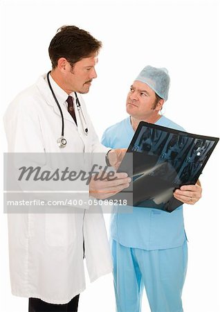 Doctor consulting with a surgeon on a patient's MRI.  Isolated on white.