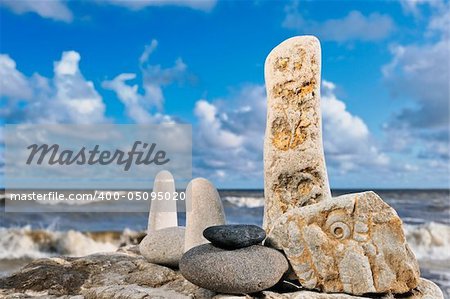 Sea pebble on seacoast in the windy morning in the summer